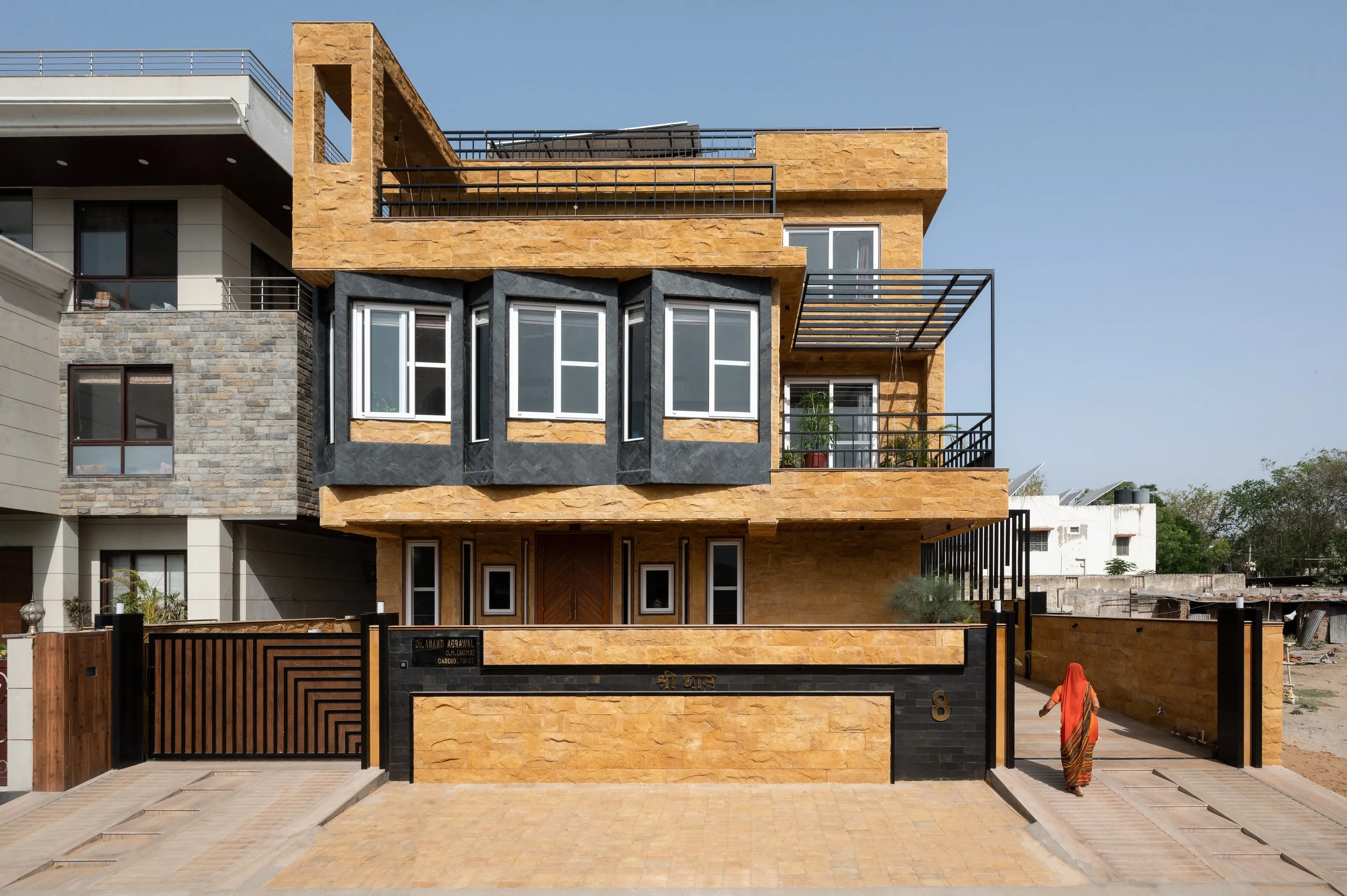 The house and its neighbours from the street
