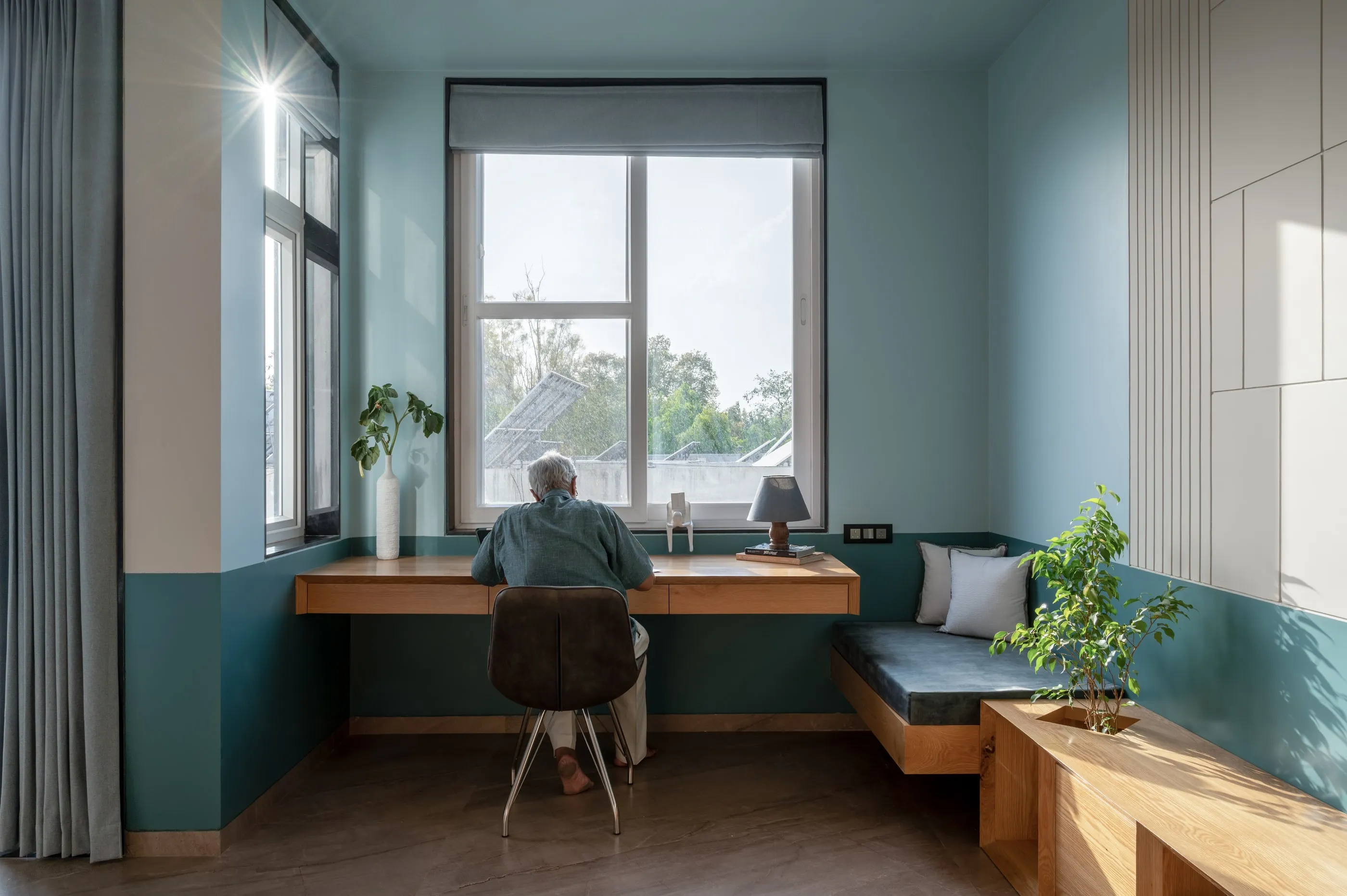 A study niche with a blue-green wall